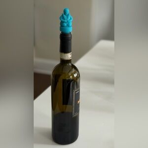 Traditional Chinese man holding wheat Stopper